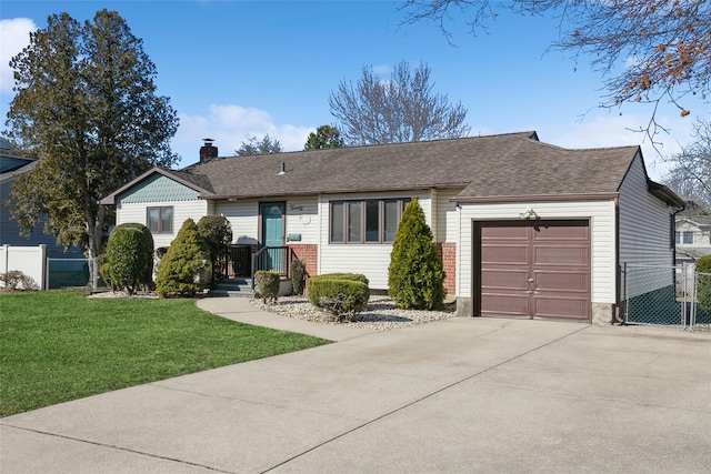 single story home featuring a front lawn, fence, a chimney, a garage, and driveway