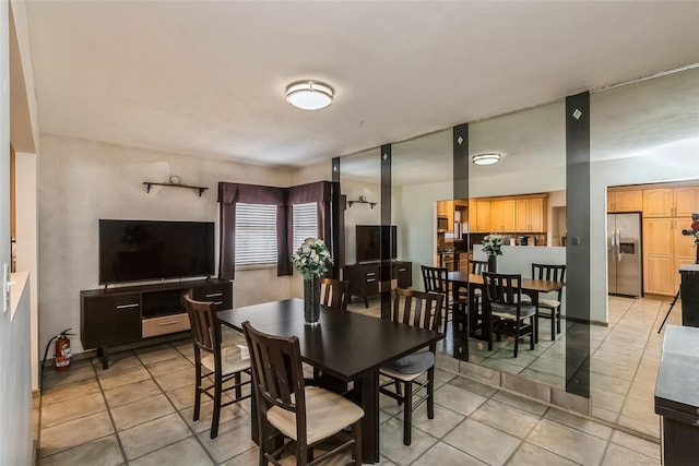 dining room featuring light tile patterned floors