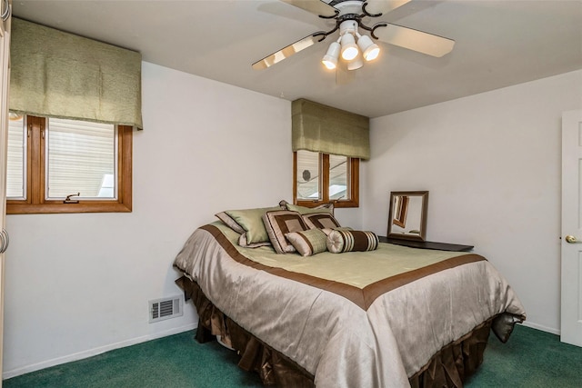 bedroom featuring baseboards, visible vents, carpet floors, and ceiling fan