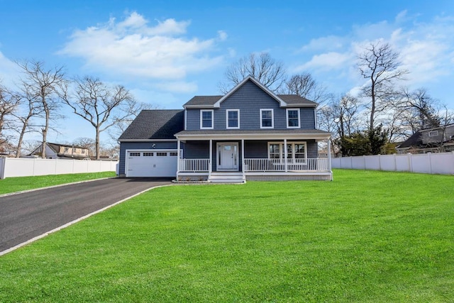 view of front of property featuring a front yard, fence, a porch, an attached garage, and aphalt driveway