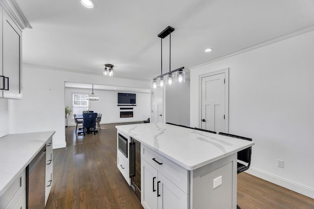 kitchen with recessed lighting, white cabinets, pendant lighting, and dark wood-style flooring