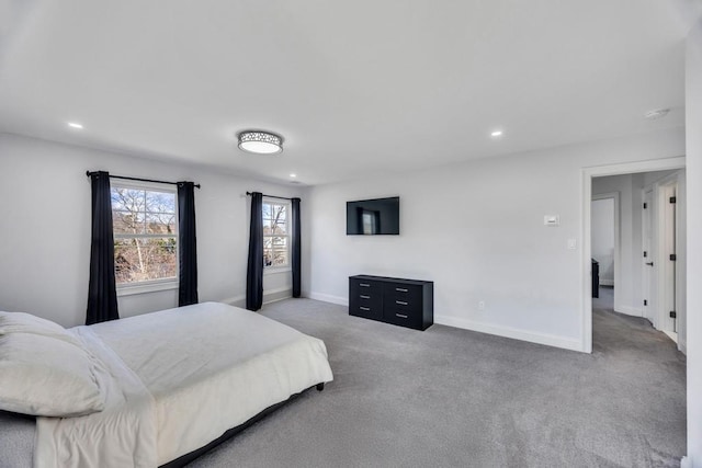 bedroom with recessed lighting, baseboards, and carpet flooring