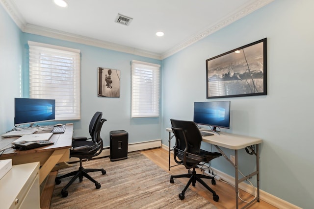 office area featuring light wood finished floors, visible vents, a baseboard heating unit, baseboards, and ornamental molding