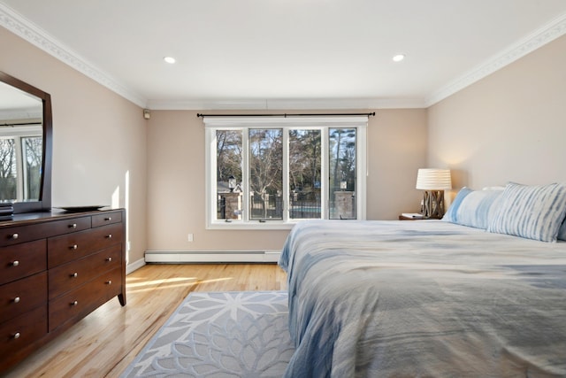 bedroom with multiple windows, ornamental molding, and a baseboard radiator