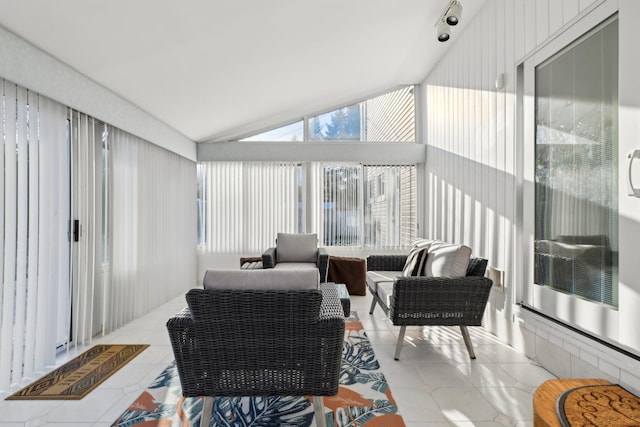 sunroom with lofted ceiling