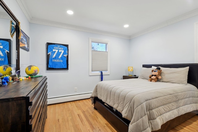 bedroom featuring recessed lighting, a baseboard heating unit, light wood-style floors, and ornamental molding