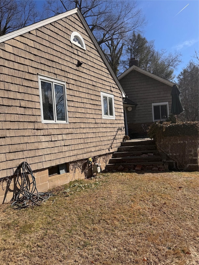 view of side of property with a chimney