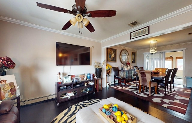 living room featuring visible vents, baseboard heating, hardwood / wood-style floors, and ornamental molding