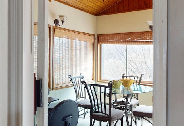 dining area with wooden ceiling and lofted ceiling