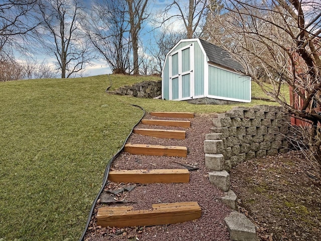 view of yard with an outdoor structure and a shed