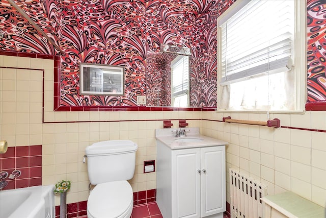 full bathroom featuring wainscoting, radiator, wallpapered walls, and tile walls