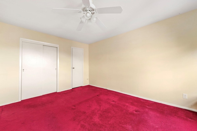 unfurnished bedroom featuring a ceiling fan, a closet, carpet floors, and baseboards