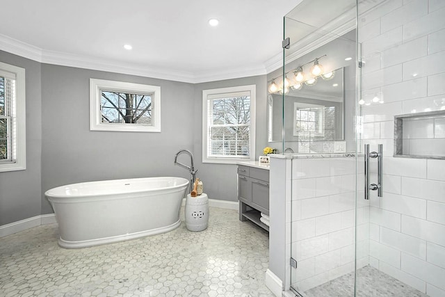 full bathroom featuring vanity, a stall shower, and ornamental molding