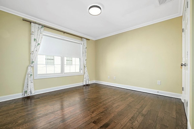 unfurnished room with visible vents, baseboards, dark wood-style flooring, and crown molding