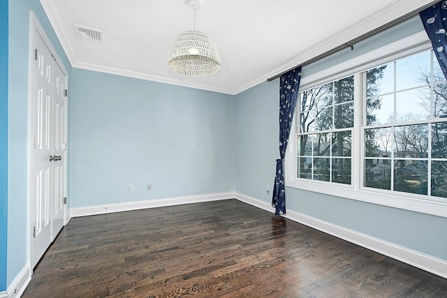 unfurnished bedroom with baseboards, visible vents, dark wood finished floors, ornamental molding, and a chandelier