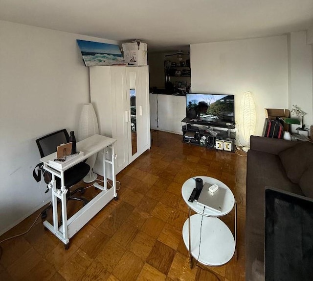 living area featuring tile patterned floors