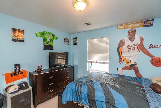 bedroom with light carpet and visible vents