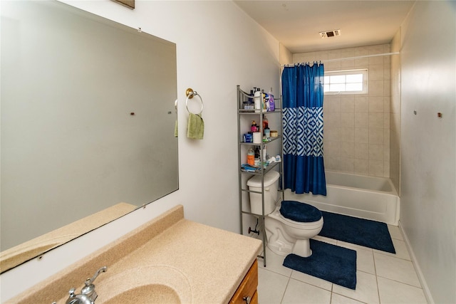 full bathroom featuring vanity, visible vents, tile patterned floors, toilet, and shower / tub combo with curtain