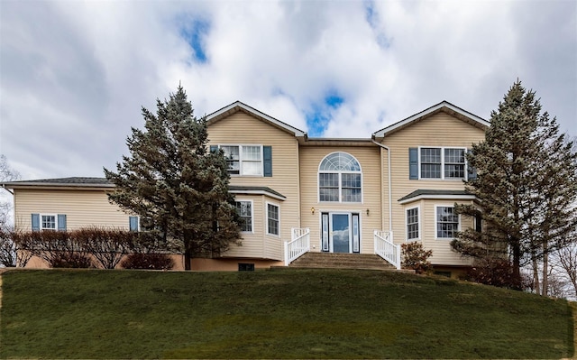 traditional home with a front lawn