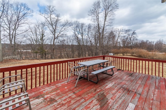 deck featuring outdoor dining area