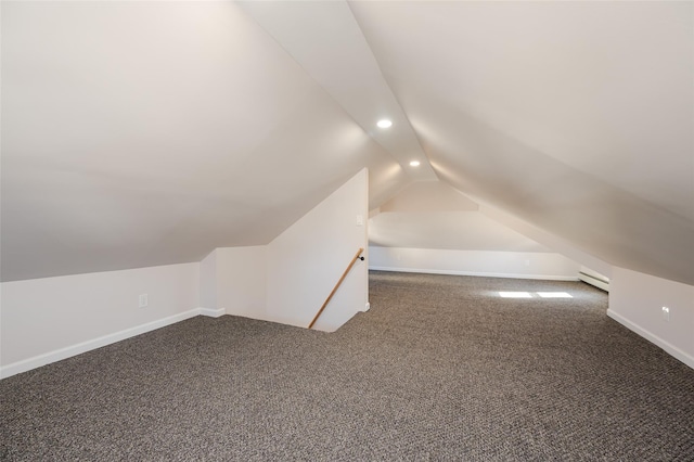 bonus room featuring baseboards, recessed lighting, vaulted ceiling, carpet flooring, and baseboard heating