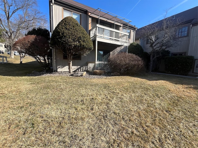 27 Sycamore Dr Bldg 2A, Middletown, NY 10940 - back of house featuring a lawn and a balcony