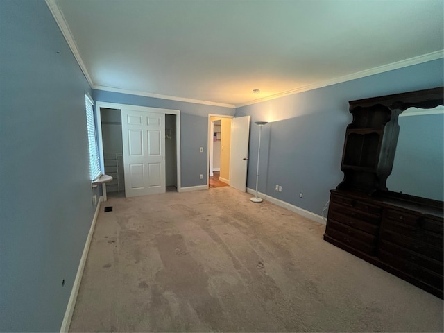 27 Sycamore Dr Bldg 2A, Middletown, NY 10940 - unfurnished bedroom with visible vents, baseboards, carpet floors, a closet, and crown molding
