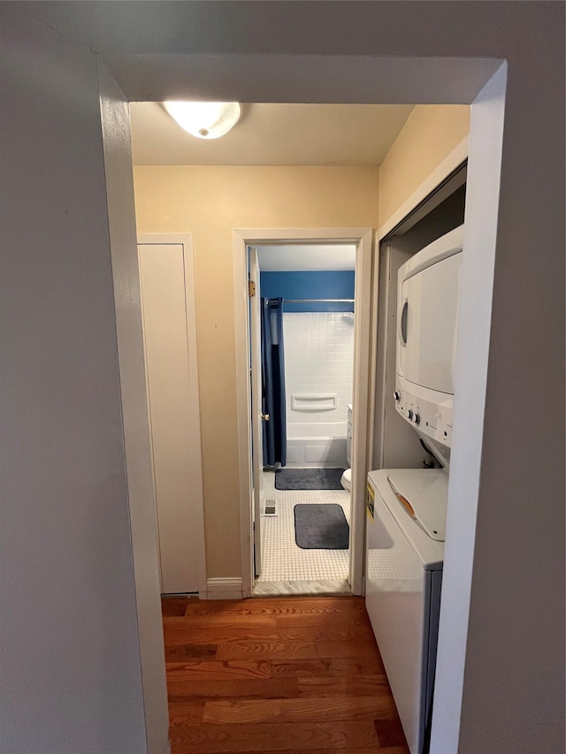 27 Sycamore Dr Bldg 2A, Middletown, NY 10940 - laundry area with laundry area, wood finished floors, and stacked washer / drying machine