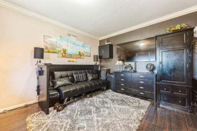 sitting room with dark wood finished floors, baseboards, and ornamental molding