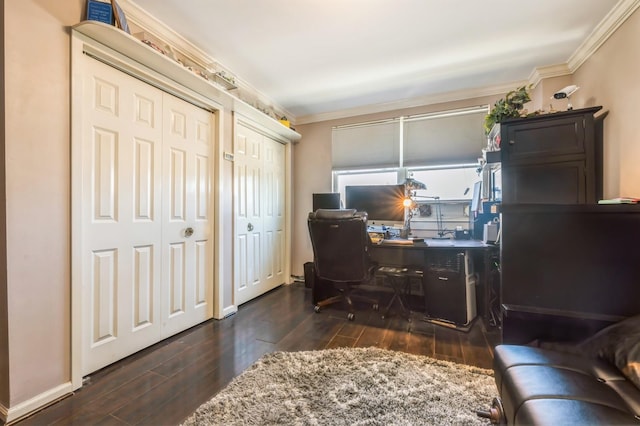 home office with crown molding and dark wood-type flooring