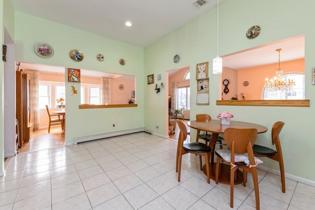 dining space with light tile patterned floors, a baseboard radiator, recessed lighting, visible vents, and baseboards