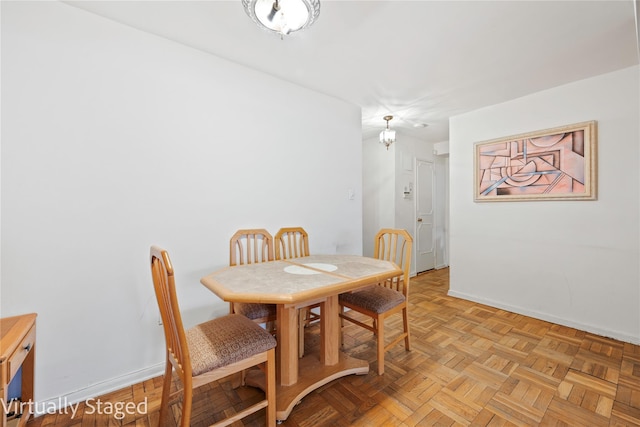 dining space with baseboards