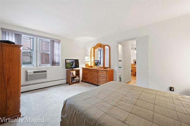 bedroom featuring a baseboard heating unit, an AC wall unit, connected bathroom, and light carpet