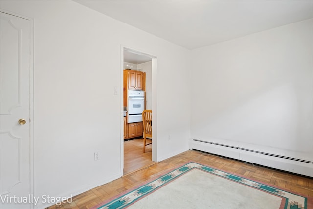 bedroom featuring baseboard heating