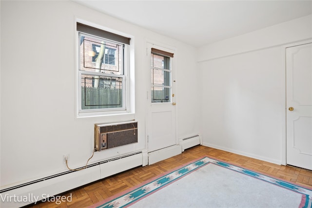 foyer featuring a wall unit AC