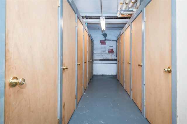 corridor with finished concrete flooring