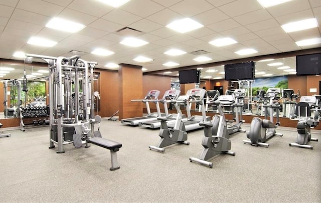 workout area featuring a drop ceiling and visible vents