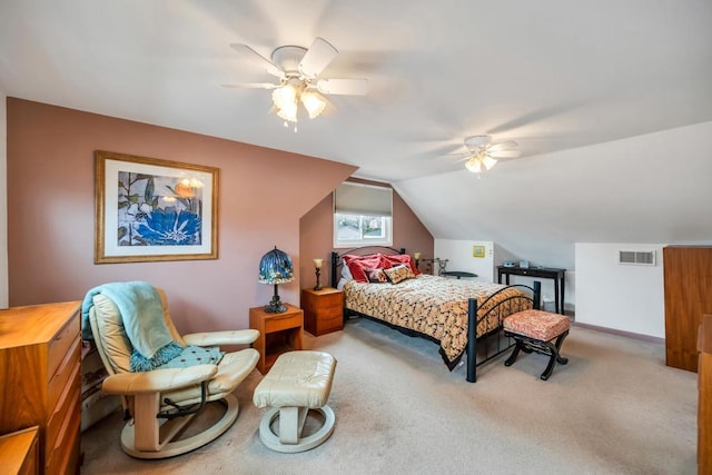 carpeted bedroom featuring visible vents, lofted ceiling, baseboards, and ceiling fan