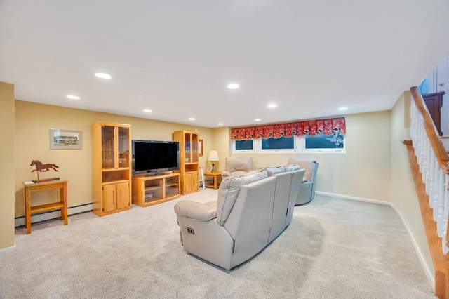 living area with recessed lighting, a baseboard radiator, baseboards, and carpet