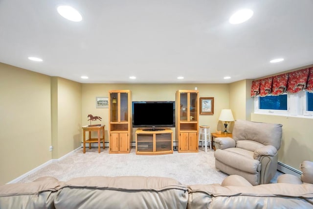 carpeted living area with a baseboard heating unit, recessed lighting, baseboards, and baseboard heating