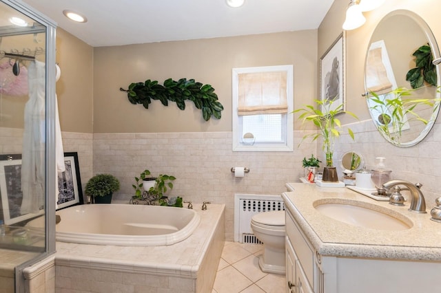 full bathroom with toilet, radiator heating unit, a bath, tile patterned floors, and vanity