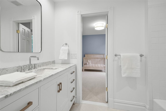 bathroom featuring tile patterned floors, visible vents, and vanity