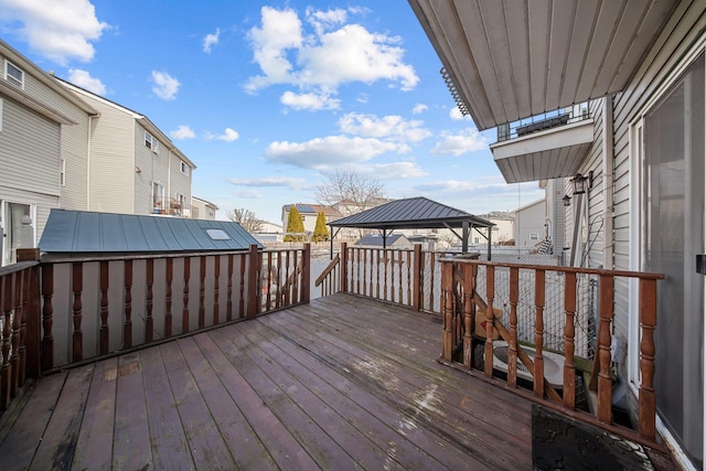 wooden deck with a gazebo