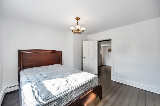 bedroom with a baseboard radiator, a notable chandelier, baseboards, and wood finished floors