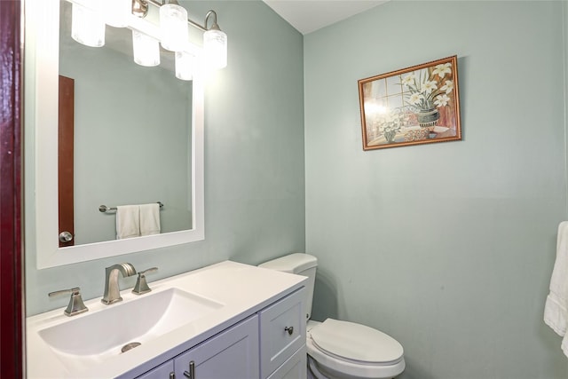 half bath with toilet and vanity