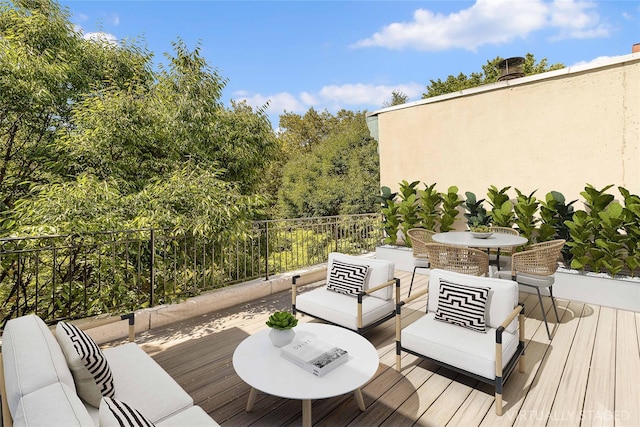 deck featuring an outdoor living space