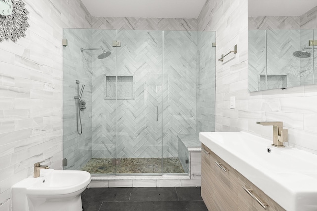 full bath featuring a stall shower and tile walls