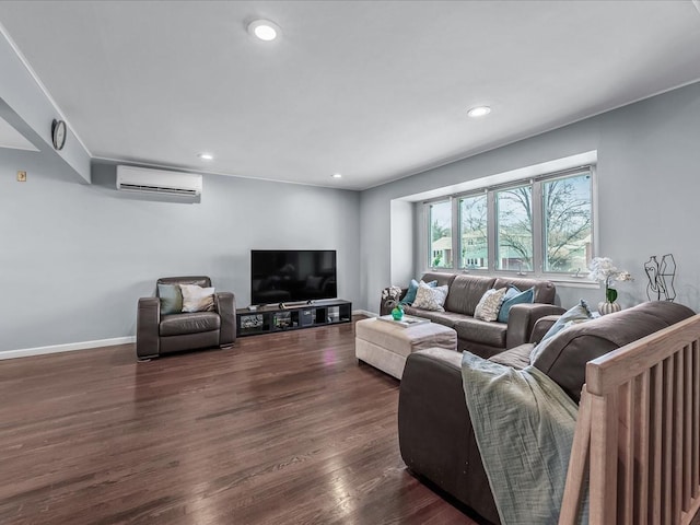 living room featuring an AC wall unit, recessed lighting, dark wood-type flooring, and baseboards