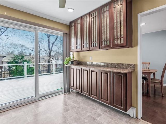 doorway with recessed lighting and ceiling fan