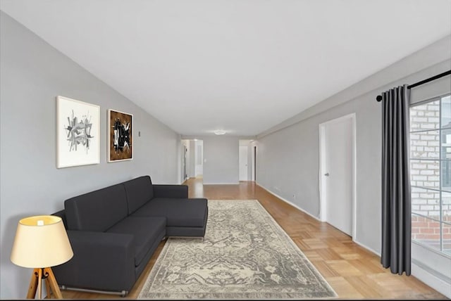 living area with lofted ceiling